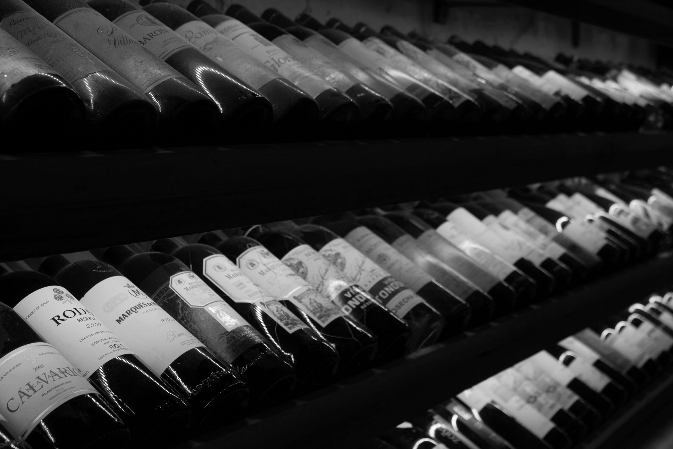 Sommelier curating rare and limited wine allocations for members